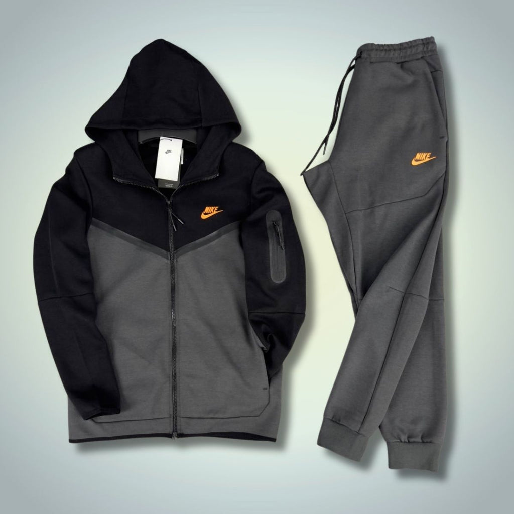 Dres męski Nike Tech Fleece, czarny - grafitowy, pomarańczowe logo. Jakość premium