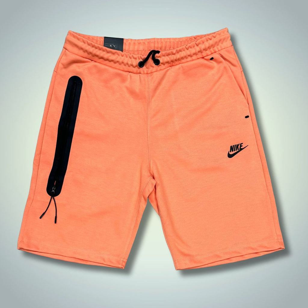 Męskie spodenki Nike Tech Fleece, pomarańczowe. Model 2024. Jakość premium